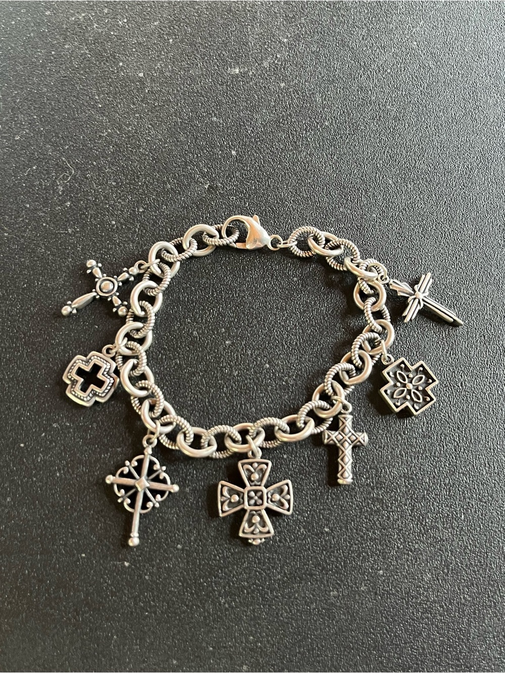 Sterling Silver Ann King “Crosses of the world” Bracelet w 7 crosses. 8”.